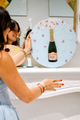 Cora B x Eras Champagne Bottles